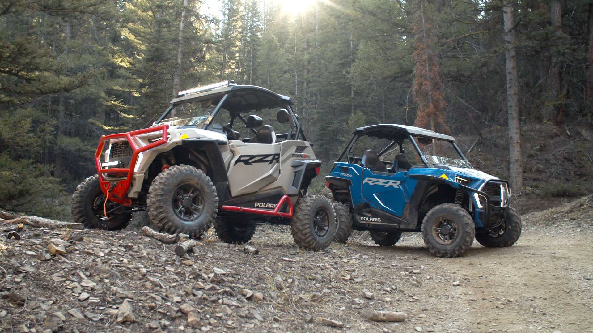 Polaris RZR Trail and RZR Trail S lifestyle shot in the woods
