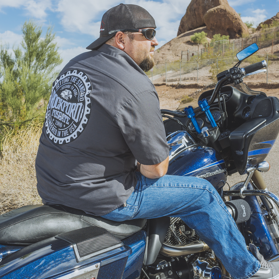 Photo Shot on a Desert Road with Man on Motorcycle with Speakers Installed