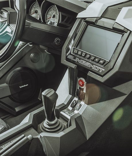 Polaris Slingshot interior with Rockford Fosgate speaker pod.