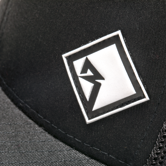 Close Up View of White Diamond R Rubber Patch on Hat